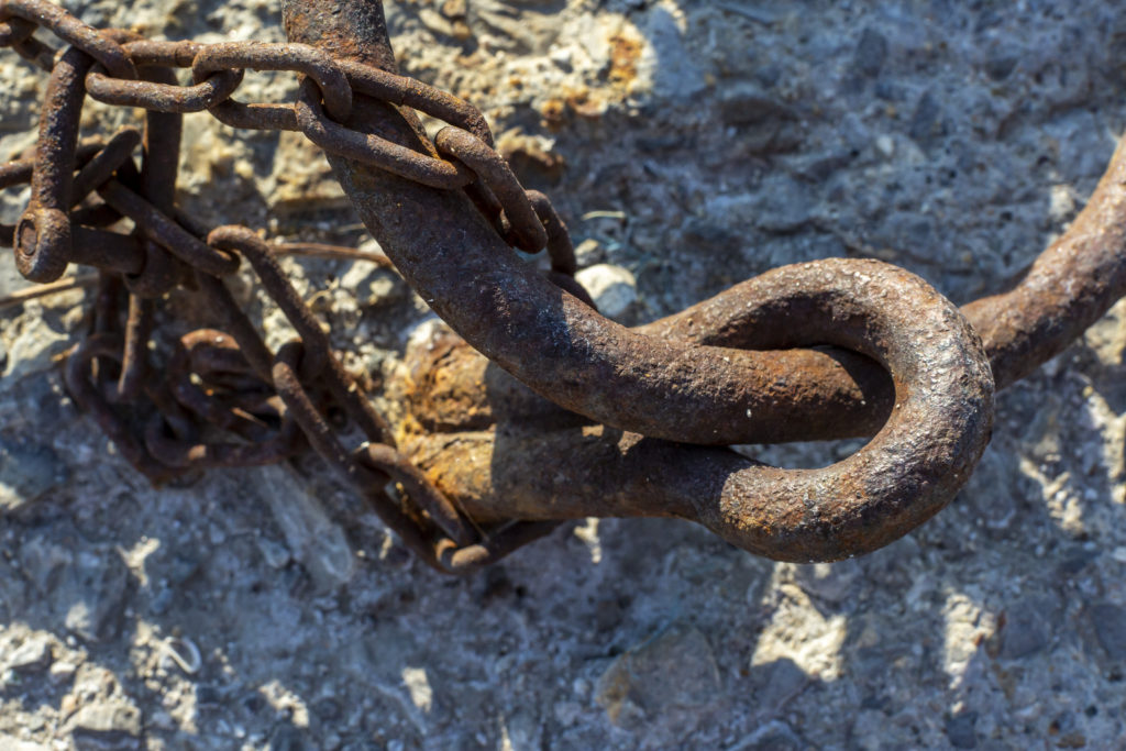 rusty mooring ring and chain